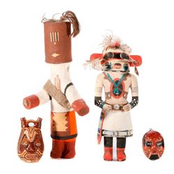 Two kachina dolls and two Mexican terra cottas.