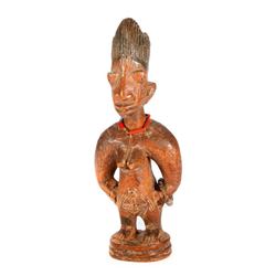 A Yoruba Ibeji figure.