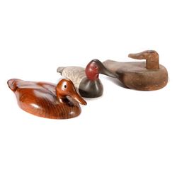 Three vintage decoys.