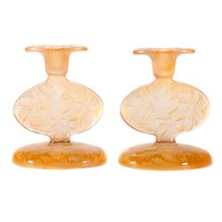 A pair of vintage glass candlesticks'