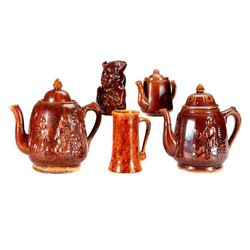 Five pieces of redware pottery.