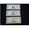 Image 1 : (3) 1957 One Dollar Silver Certificates, One is badly Damaged