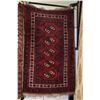 Image 1 : Iranian wool throw rug with multiple medallions, deep red background and highlights in copper, white