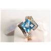 Image 1 : New old stock 14kt yellow gold, topaz and diamond ring. Set with 3.50ct square checkerboard cut blue