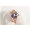 Image 1 : New old stock 10kt yellow gold, tanzanite and diamond ring. Set with .40ct oval cut tanzanite gemsto