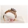 Image 2 : New old stock 10kt yellow gold, tanzanite and diamond ring. Set with .40ct oval cut tanzanite gemsto