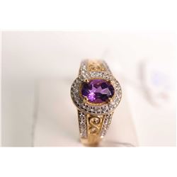 New old stock 14ky white gold, amethyst and diamond ring. Set with .75ct oval cut amethyst gemstone 