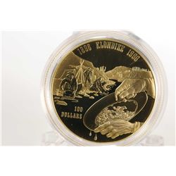 Canadian 1996 non- circulated $100 gold coin to commemorate the 100th anniversary of the first major