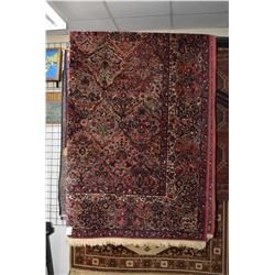 100% wool American made Karastan area carpet with geometric design with wide multiple borders in ton