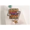 Image 1 : New old stock 14kt yellow gold and multi coloured sapphire gemstone and diamond ring. Set with forty