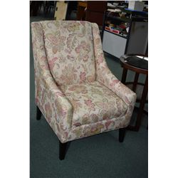 Modern parlour chair with floral upholstery