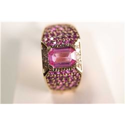 New old stock 14kt yellow gold and pink sapphire gemstone and diamond ring. Set with center emerald 