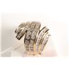 Image 1 : New old stock 10kt yellow gold and diamond ring. Set with 1.00cts of round cut and baguette white di