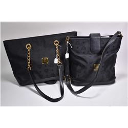Two vintage MCM bags including black canvas monogrammed Visetos with chain handles and a bucket bag 