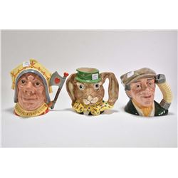 Three Royal Doulton character jugs including The Red Queen D6777, The March Hare D6776 and The Buske