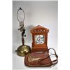 Image 1 : Electrified brass oil lamp, leather satchel with copper decoration and wooden mantle clock, trying t