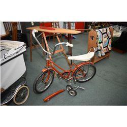 Child's vintage bicycle with banana seat, ape hanger handle bars, convertible bar to make into boy's