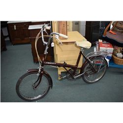 Vintage folding bicycle with an internal 3 speed system, model no. 20 made in England by Phillips, a