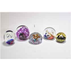 Five vintage glass paperweights