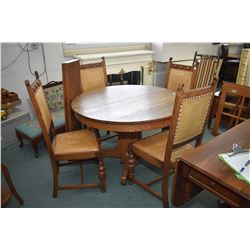 Antique center pedestal 42" round dining table with 10" insert leaves plus four complimenting Tudor 