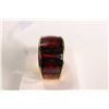 Image 1 : New old stock 18kt yellow gold and garnet gemstone ring. Set with cushion cut channel set garnet rin
