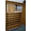 Image 3 : Bacchus wine cabinet with two carved oak wine themed paneled doors, tiled interior prep surface, fiv