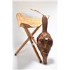 Image 1 : Folk art carved face bellows signed by artist and a three legged tooled leather stool from The Weste