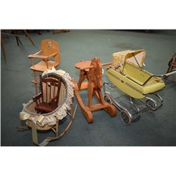 Selection of nursery items including a vintage metal doll's pram, a maple doll's highchair, doll's r