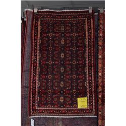 100% handmade Iranian Hamaden throw carpet with geometric design, background of deep red, highlights