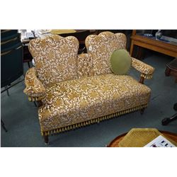 Victorian two seat settee reupholstered in gold tone brocade