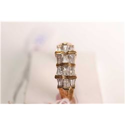 New old stock 10kt yellow gold and diamond ring. Set with .40ct baguette cut diamonds