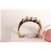 Image 2 : New old stock 10kt yellow gold and diamond ring. Set with .40ct baguette cut diamonds