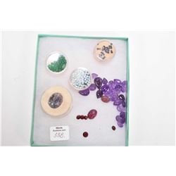 Selection of loose gemstones including small opals emeralds, garnets and amethyst etc.