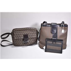 Two vintage Fendi purses and a Fendi passport/ticket holder