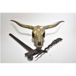 Brass Texas longhorn skull 27" in width, and an Indonesian knife with heavily carved wooden handle a
