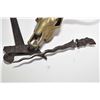 Image 2 : Brass Texas longhorn skull 27" in width, and an Indonesian knife with heavily carved wooden handle a
