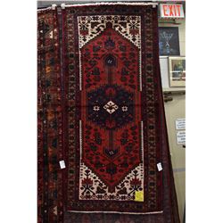100% handmade Iranian Zanjan area carpet with center medallion, red background and highlights in blu
