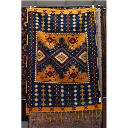 Moroccan wool area carpet with bright orange background, royal blue, red and cream highlights 48" X 