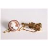 Image 1 : Two vintage brooches including violin marked 15ct and an unmarked carved cameo brooch, both with saf