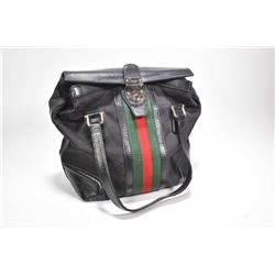 Vintage canvas Gucci purse with leather accents and straps