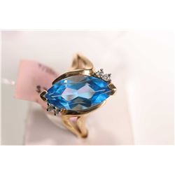 10kt yellow gold, marquise cut blue topaz and diamond ring