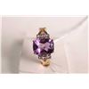 Image 1 : New old stock 10kt yellow gold, amethyst and tanzanite gemstone ring