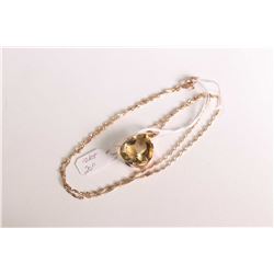 10kt yellow gold 20" neck chain with a pear shaped citrine gemstone pendant