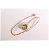 Image 1 : 10kt yellow gold 20" neck chain with a pear shaped citrine gemstone pendant