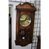 Image 1 : Semi contemporary vintage style wall clock in wood case with brass dial, visible pendulum and 15 day