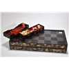 Image 1 : Antique Chinese lacquered game board/box includes thirty two ivory chess pieces, a few with some dis