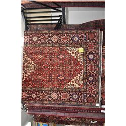 100% handmade Iranian Hossien Abad area carpet with center medallion and highlights of red, cream, b