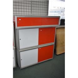 Two Texaco service station floor cabinets each one with one white and one orange sliding doors plus 