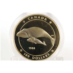 Canadian 1988 non- circulated $100 gold coin featuring a whale design by Ontario artist Robert-Ralph