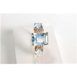 New old stock 10kt blue topaz and diamond ring